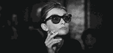 Curious GIF - Audrey Hepburn Smoking Curious GIFs