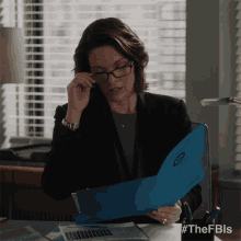 taking off glasses isobel castille fbi putting off glasses removing glasses