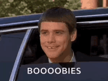 Jim Carrey Boobies GIF - Jim Carrey Boobies Dumb And Dumber GIFs