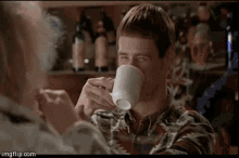 looking for a gif of dumb & dumber on a coffee mac ?