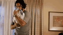 holding a baby this is us this is us gifs carry carrying