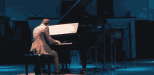Playing Piano Performance GIF - Playing Piano Performance Stage GIFs