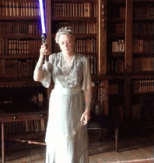 Lightsaber Maggie Smith GIF - Lightsaber Maggie Smith Queen GIFs
