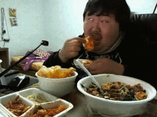 Eating Lots Of Food GIF - Eating Lots Of Food White Eyes GIFs