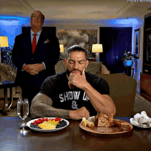 Roman Reigns Food GIF - Roman Reigns Food Head Of The Table GIFs