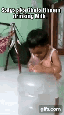Kid Drinking GIF - Kid Drinking Big Container GIFs