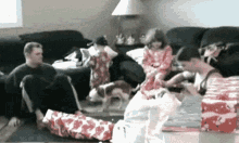 This Is The Worst Present.. GIF - Xmas Merry Christmas Holidays GIFs