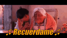 Miguel Dándole Un Beso A Abuela Coco GIF - Recuerdame Coco Miguel GIFs