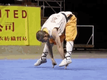 Shaolin Monk Balances On 2 Fingers GIF - Kung Fu GIFs