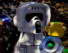 Lego Star Wars Scout Trooper GIF - Lego Star Wars Scout Trooper Smelling Flowers GIFs