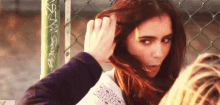 Lily Collins Hair Fix GIF - Lily Collins Lily Hair Fix GIFs