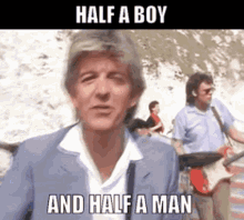 Nick Lowe Half A Boy And Half A Man GIF - Nick Lowe Half A Boy And Half A Man 80s Music GIFs