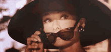 Blink GIF - Blink Audrey Hepburn Shades GIFs