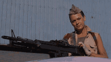Hell Comes To Frogtown Girl With Gun GIF - Hell Comes To Frogtown Girl With Gun Big Gun GIFs