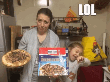 Lol What Mom And Daughter GIF - Lol What Mom And Daughter Chocolate Cookie GIFs