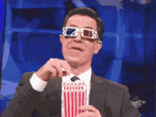 Stephen Colbert Popcorn Munching GIF - Popcorn Stephencolbert Popcornday GIFs