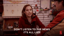 Lies Everywhere GIF - Ellie Kemper Dont Listen To The News Its All Lies Unbreakable Kimmy Schmidt GIFs