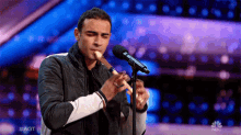 Playing The Flute Americas Got Talent GIF - Playing The Flute Americas Got Talent Agt GIFs