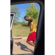 dancing outside the car