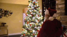 Sml Santa Claus GIF - Sml Santa Claus Knocking Tree Over GIFs