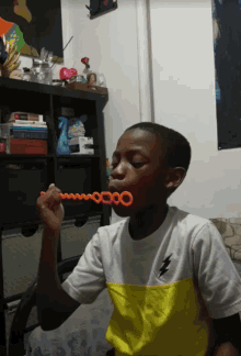Boy Blowing GIF - Boy Blowing Bubbles GIFs