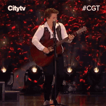 Playing The Guitar Kellie Loder GIF - Playing The Guitar Kellie Loder Canadas Got Talent GIFs