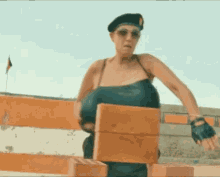 Busty Heart The Dictator GIF - Busty Heart The Dictator Brick GIFs