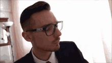 Eating Awesome GIF - Eating Awesome Suit GIFs