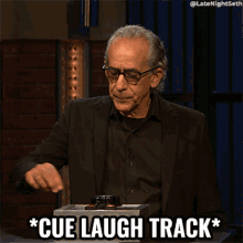 Cue Laugh Track Late Night With Seth Meyers GIF - Cue Laugh Track Late Night With Seth Meyers Laugh GIFs