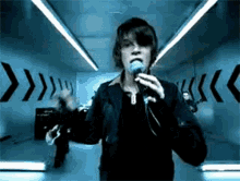 singing mic holding mic make damn sure music video the band singing mic holding mic make damn sure music video the band
