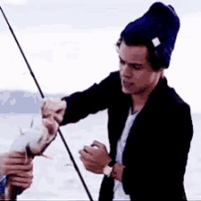 Harry Styles One Direction GIF - Harry Styles One Direction Fish GIFs