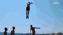 Seesaw Acrobatics People Are Awesome GIF - Seesaw Acrobatics People Are Awesome Launched Into Air GIFs