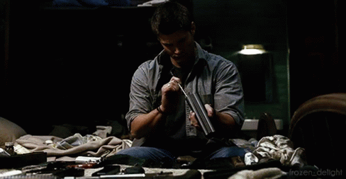 cleaning-weapons-robert.gif