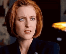 Annoyed Gillian Anderson GIF - Annoyed Gillian Anderson Scully GIFs