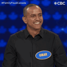staring family feud canada looking smiling cbc
