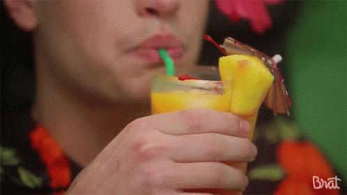 Sipping Tropical Drink GIF