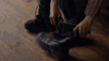 Putting My Shoes On Disperse GIF - Putting My Shoes On Disperse Kites Song GIFs