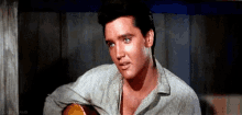 Elvis GIF - Elvis Presley Shy Smile GIFs