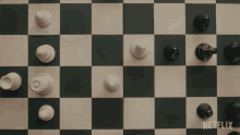 Playing Chess The Queens Gambit GIF - Playing Chess The Queens Gambit Moving Chess Pieces GIFs
