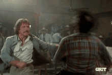 Chuck Norris Fight GIF - Chuck Norris Fight Attack GIFs