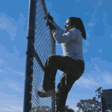 climbing up the fence michelle khare going up training practice