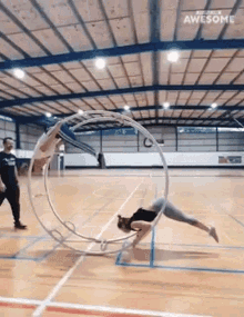 Cyr Wheel People Are Awesome GIF - Cyr Wheel People Are Awesome Acrobatic Apparatus GIFs
