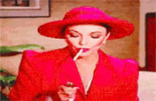 Joan Collins Smoke GIF - Joan Collins Smoke Cigarette GIFs