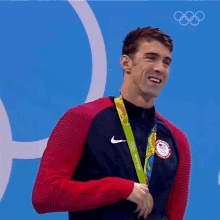 Kiss The Medal Michael Phelps GIF - Kiss The Medal Michael Phelps Olympics GIFs