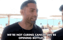 We Are Not Curing Cancer We Are Opening Bottles Beach GIF - We Are Not Curing Cancer We Are Opening Bottles Beach Serious GIFs